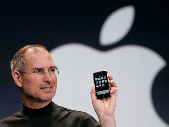 Steve Jobs showing the first iPhone